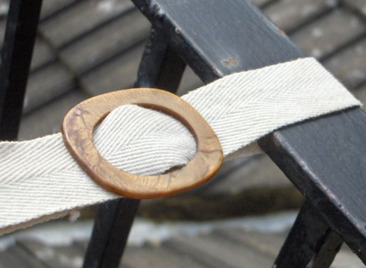 Tape buckled around railing